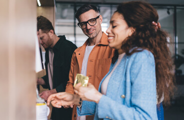 Cheerful colleagues in office together