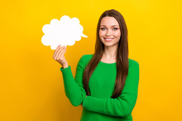 Portrait of cute cheerful girl arm hold empty space cloud shape card isolated on yellow color background