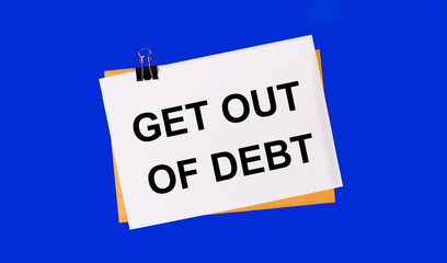 On a bright blue background, an envelope and a sheet of paper with the text GET OUT OF DEBT under the paper clip.