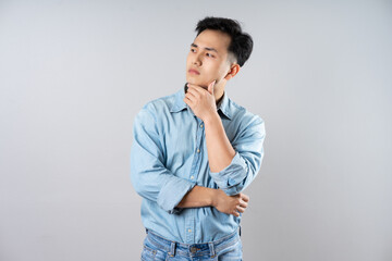 Fototapeta premium image of young businessman male on gray background