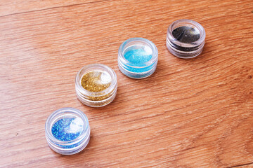 Sequins for needlework in bags on the table