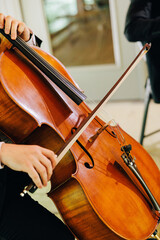 close up of a person playing violin