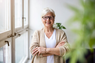 Portrait of smiling senior businesswoman in an office
