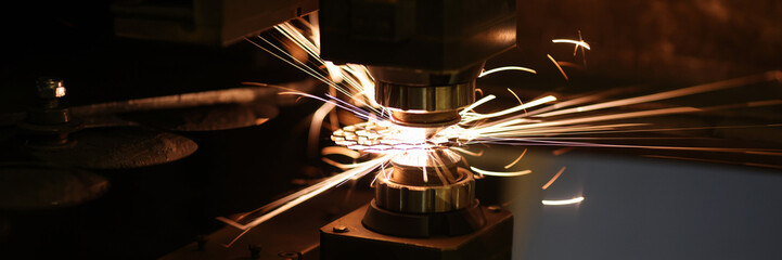 Metal cutting process and neon sparks flying out