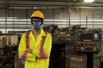 Chemical experts wearing gas masks working at hazardous areas of industrial chemicals factory