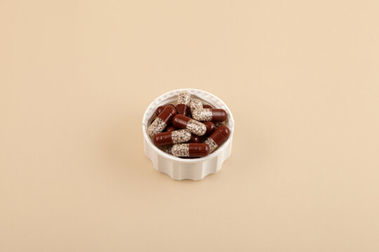 Capsules filled with gastro-resistant granules. Pancreatic enzymes, also known as pancreases or pancrelipase and pancreatin. They help the person digest fats, starches, and proteins