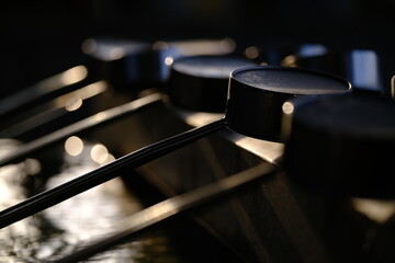 Obraz premium Close Up of Wooden Ladles at Shinto Shrine Purification Fountain
