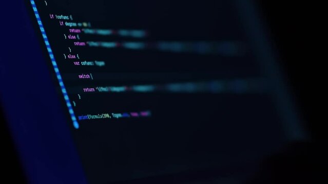 Close-up of the screen with the programmer's code, software development