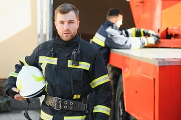 Fototapeta premium Fireman on duty,under exposed photo.
