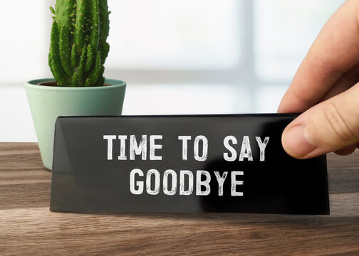 Text Time To Say Goodbye writen on black table card