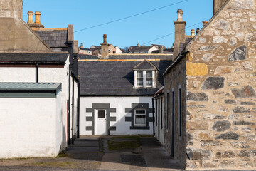 3 April 2023. Seatown,Cullen,Moray,Scotland. This is some street architecture within the old fishing town part of Cullen on the Moray Coast on a very sunny April afternoon in Spring.