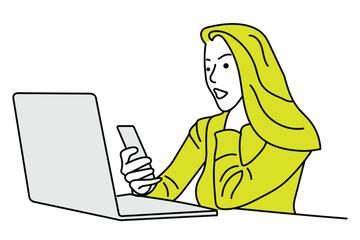 Woman in Yellow Turtleneck Sweater Holding Phone Sitting Beside Laptop