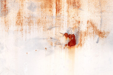 Corroded metal background. Rusted white painted metal wall. Rusty metal background with streaks of...