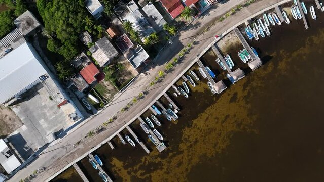 Aerial view of boats docked at the pier along the coast in Rio Lagartos, Yucatan, Mexico.