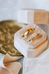 wedding rings on a pillow