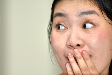A Surprised Attractive Minority Woman