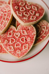 Heart cookie with sprinkles flat lay