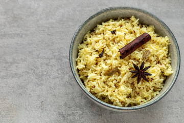 Jeera rice, Indian cuisine. Basmati rice with anise star, cardamom, cinnamon, cloves and cumin seeds.