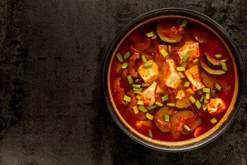 Sundubu jjigae: Korean spicy soft tofu stew with zucchini, scallions, shiitake, silken tofu.