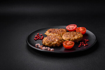 Delicious fresh fried minced fish cutlets with spices and herbs