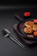 Delicious fresh fried minced fish cutlets with spices and herbs