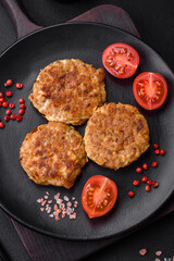 Delicious fresh fried minced fish cutlets with spices and herbs