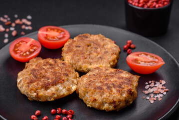 Delicious fresh fried minced fish cutlets with spices and herbs