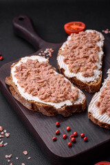 Delicious sandwiches consisting of grilled toast, canned tuna and cream cheese