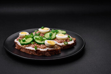 Delicious sandwiches consisting of grilled toast, canned tuna, cream cheese