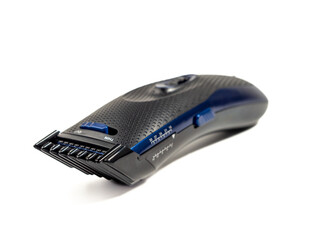 Hair clipper isolated on white background. Modern hair clipper. Close-up.