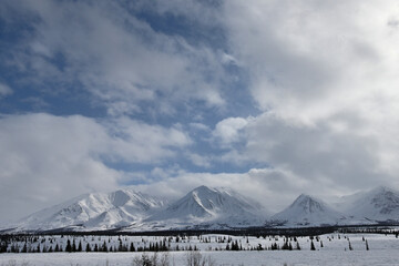 Snow covered mountains in the Alaska Range in winter.