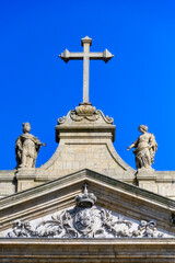 Christian cross and statues in Church of Lapa, Oporto, Portugal