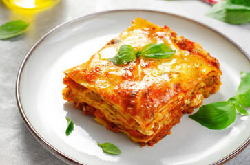 Delicious Homemade Lasagna with Bolognese Sauce on Bright Background, Italian Cuisine, Tasty Baked Lasagna