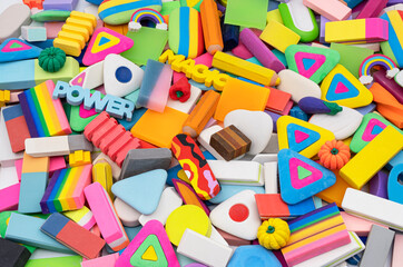 a bunch of multicolored erasers, top view