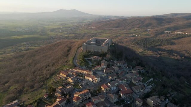 Aerial view of Castel Lagopesole, a small town with a fort on hilltop, Avigliano, Potenza, Basilicata, Italy.