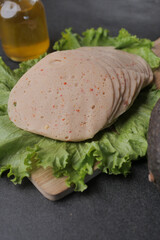 salami sausage cut into thin pieces 