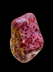 Photo of a Polished, Natural Stone Jasper in A Colorful Violet-Green Hue. Isolated On Black Background