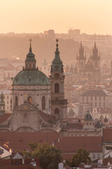 Fototapeta na wymiar Early morning view of Prague, Czech Republic. St. Nicholas Church and Church of Our Lady before Tyn visible.