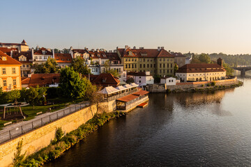 Fototapeta na wymiar View of Vltava river riverside in Prague, Czech Republic