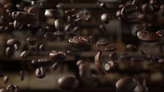 close up of coffee beans in the air