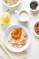 Oat porridge with caramelized pear and peanut