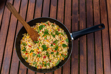 Pan of rice with vegetables