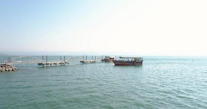Aerial view of recreation ferry by the pier, Sea of Galilee, Israel.