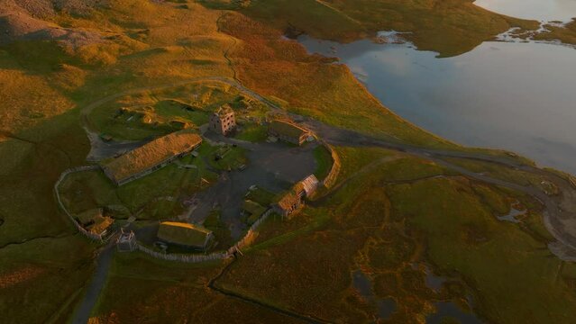 Aerial view of a Viking village along the lake in Austurland, Iceland.