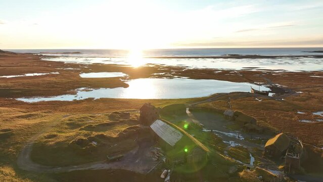 Aerial view of a Viking village along the lake in Austurland, Iceland.