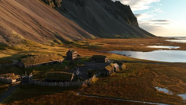 Aerial view of a Viking village along the lake in Austurland, Iceland.