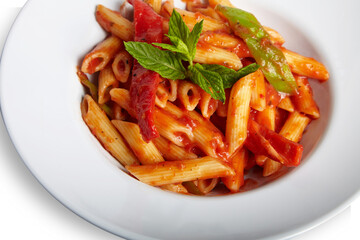 Penne Arrabbiata Pasta With Tomato Sauce on White Plate Isolated White Background Close Up PNG File
