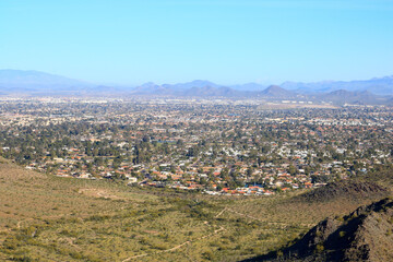 Fototapeta na wymiar Aerial view of Phoenix and Scottsdale from North Mountain Park hiking trail, Arizona 