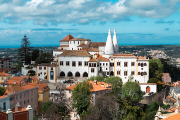 Sintra, Lisboa, Portugal. April 10, 2022: Panoramic landscape of the national palace of sintra and blue sky.