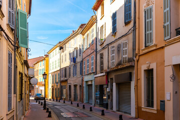 View of typical narrow streets in small medieval French township of Brignoles on sunny autumn day, Var department.